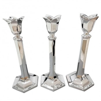 Three silver candlesticks